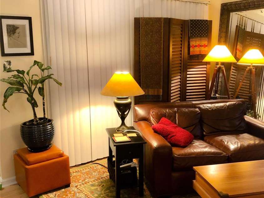 1101 Morehead Street, Charlotte, NC 28204.  MLS# CAR4276615, YatesRealty ID 18298. Living room setup when it was owner occupied.