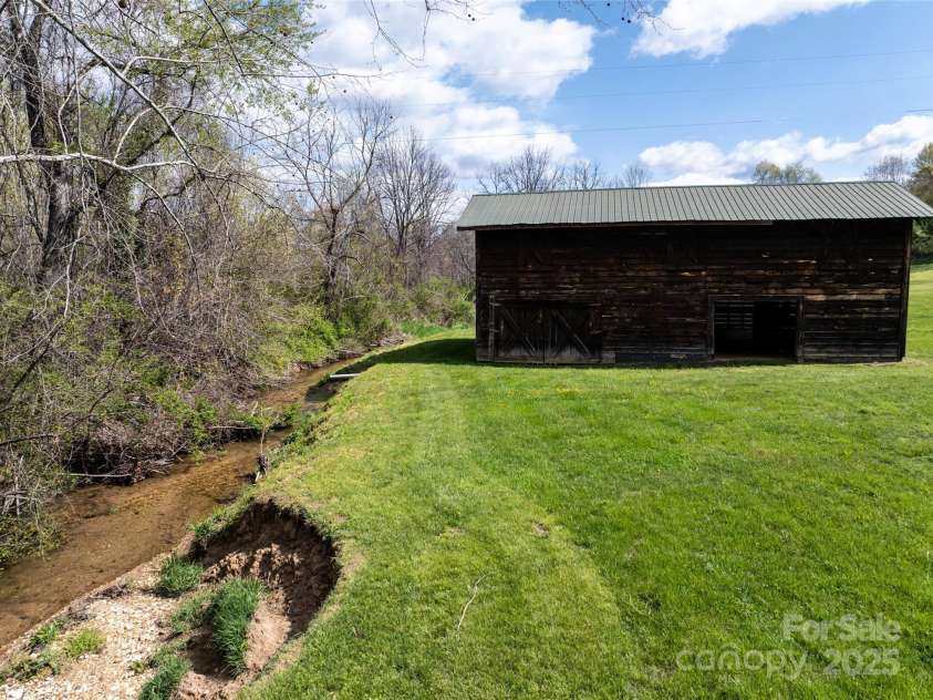 20 & 28 Toby Drive, Asheville, NC 28806.  MLS# CAR4261356, YatesRealty ID 183. 2 Stall barn with hayloft.