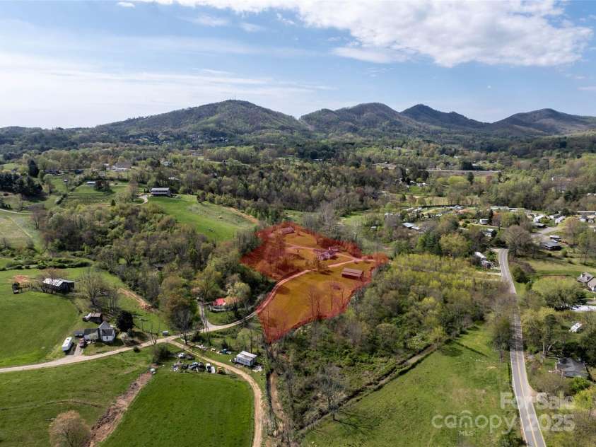 20 & 28 Toby Drive, Asheville, NC 28806.  MLS# CAR4261356, YatesRealty ID 183. +/- 3 acres nestled beneath the mountains!