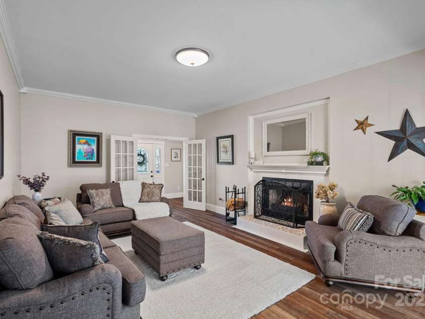 235 Stafford Estates Drive, Salisbury, NC 28146.  MLS# CAR4241796, YatesRealty ID 18300. Living Room with wood burning fireplace