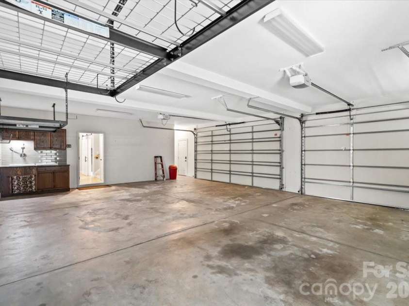 7832 Chapel Creek Drive, Denver, NC 28037.  MLS# CAR4416487, YatesRealty ID 18300. 3 Car Garage W/ Storage
