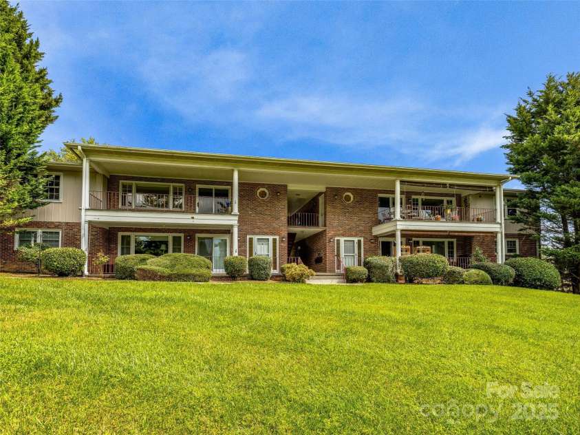 410 Golf View Condo Lane, Hendersonville, NC 28739.  MLS# CAR4267713, YatesRealty ID 18302. Left Upper Unit