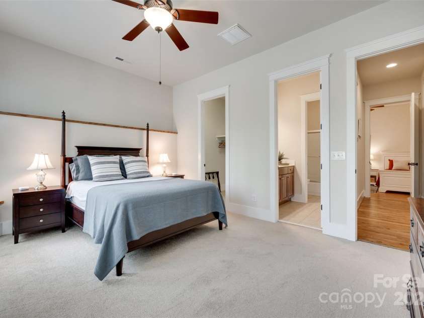 18311 Rosapenny Road, Charlotte, NC 28278.  MLS# CAR4256637, YatesRealty ID 18305. Elegant guest suite featuring high ceilings, neutral palette, and direct access to a nearby full bathroom for added convenience.