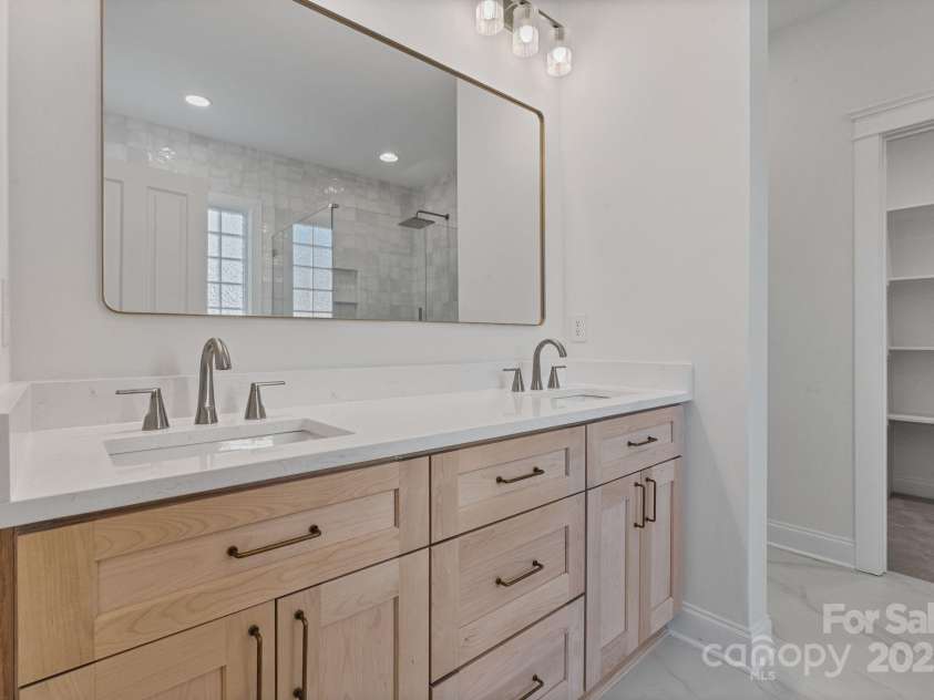 506 Academy Street, McAdenville, NC 28101.  MLS# CAR4330594, YatesRealty ID 18316. Double vanities with updated features