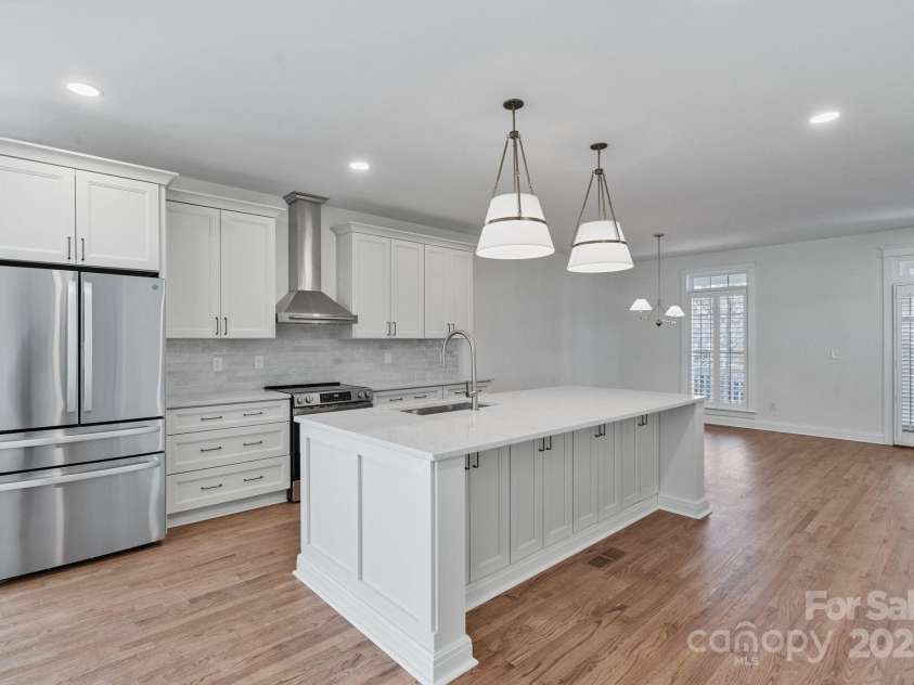 506 Academy Street, McAdenville, NC 28101.  MLS# CAR4330594, YatesRealty ID 18316. Enjoy cooking on all new appliances and under island storage.