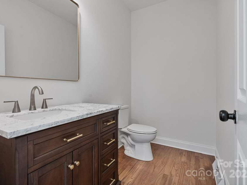 506 Academy Street, McAdenville, NC 28101.  MLS# CAR4330594, YatesRealty ID 18316. Half bath off breakfast area