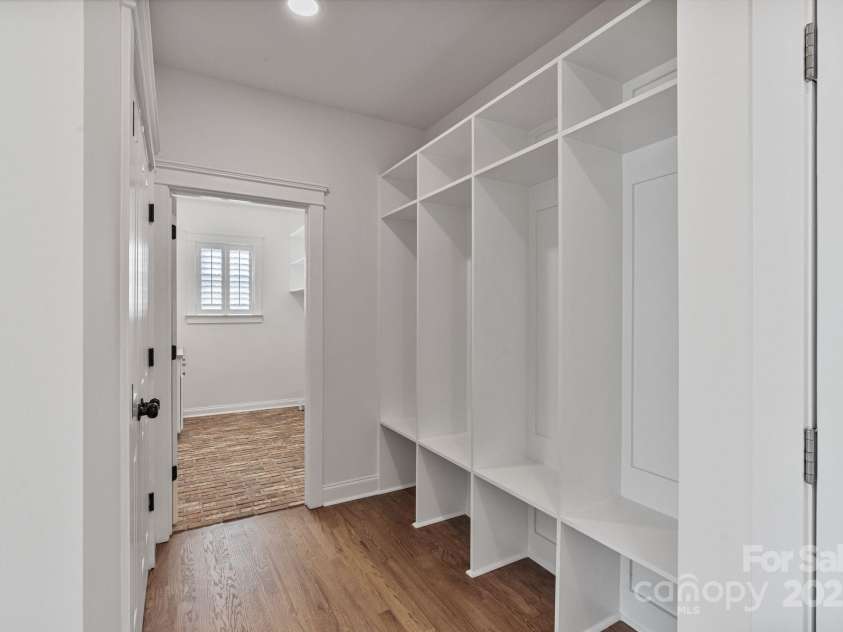 506 Academy Street, McAdenville, NC 28101.  MLS# CAR4330594, YatesRealty ID 18316. If storage and modern finishes are on your list ... this is your space! 4 station drop zone off garage.