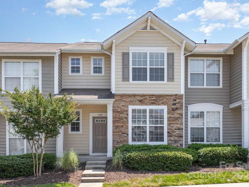 230 Dawn Mist Lane, Fort Mill, SC 29708.  MLS# CAR4264170, YatesRealty ID 18317. Front elevation with covered front porch!