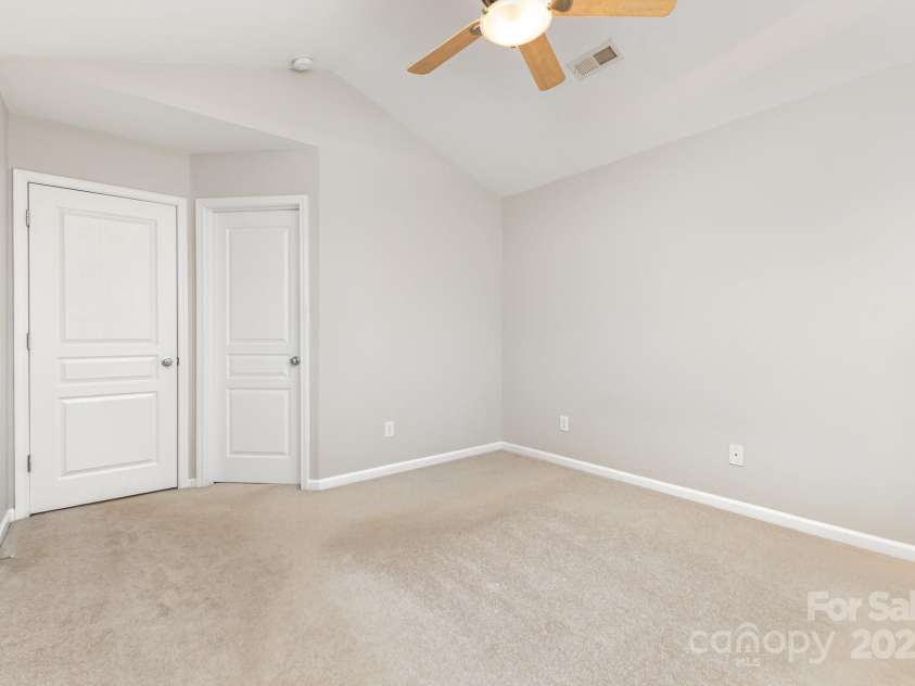 230 Dawn Mist Lane, Fort Mill, SC 29708.  MLS# CAR4264170, YatesRealty ID 18317. Primary bedroom entrance and closet entrance.