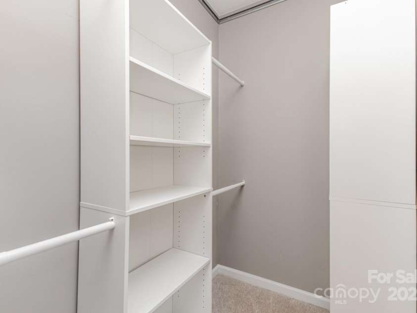 230 Dawn Mist Lane, Fort Mill, SC 29708.  MLS# CAR4264170, YatesRealty ID 18317. Primary closet has custom built-ins, providing ample storage!