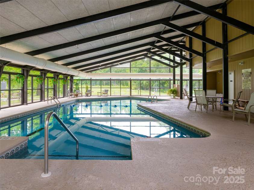 502 Spanish Oak Lane, Hendersonville, NC 28791.  MLS# CAR4260697, YatesRealty ID 18322. Community Indoor Pool Open Year Round