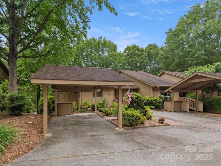 502 Spanish Oak Lane, Hendersonville, NC 28791.  MLS# CAR4260697, YatesRealty ID 18322. End Unit With Covered Parking and 2nd Assigned Parking Space at Front Entry
