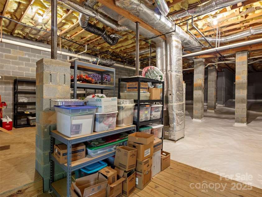 502 Spanish Oak Lane, Hendersonville, NC 28791.  MLS# CAR4260697, YatesRealty ID 18322. Floored Storage in Crawl with Spigots added to Drain Pipes if desired while traveling