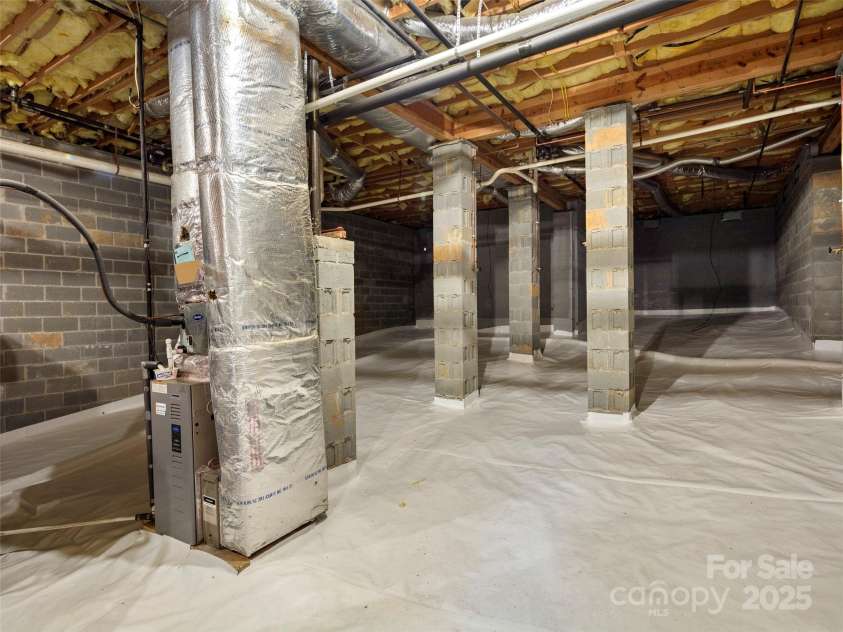 502 Spanish Oak Lane, Hendersonville, NC 28791.  MLS# CAR4260697, YatesRealty ID 18322. High Dry Crawl with Full Sized Door for easy access