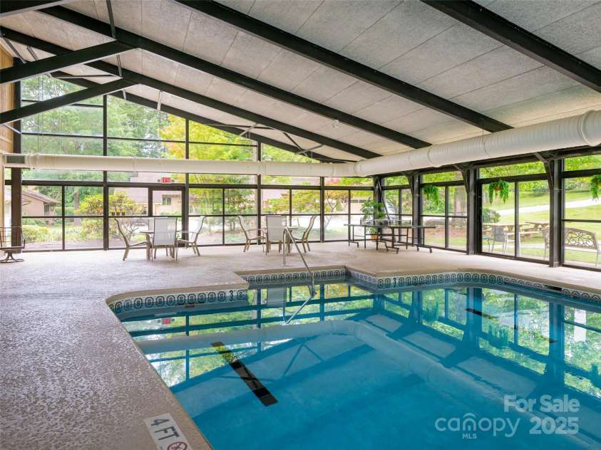 502 Spanish Oak Lane, Hendersonville, NC 28791.  MLS# CAR4260697, YatesRealty ID 18322. Indoor Pool