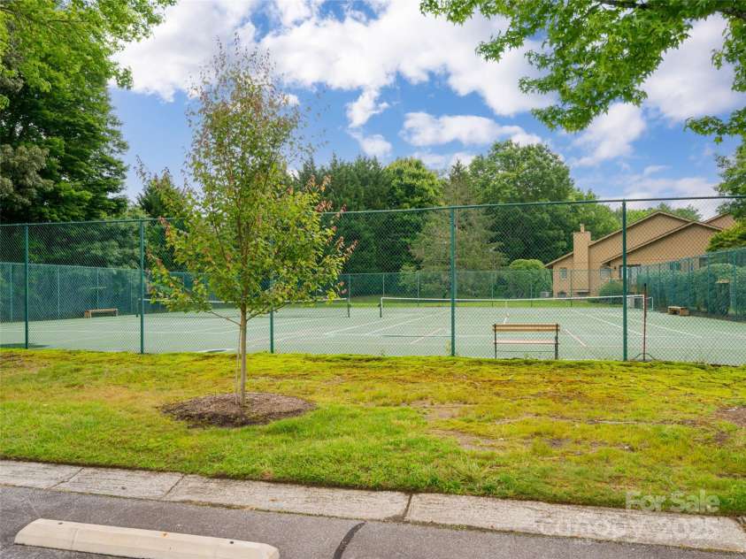 502 Spanish Oak Lane, Hendersonville, NC 28791.  MLS# CAR4260697, YatesRealty ID 18322. Tennis and Pickle Ball Courts