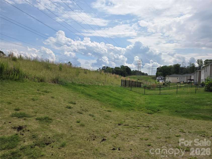 4203 Evening Trail, Concord, NC 28027.  MLS# CAR4371374, YatesRealty ID 18323. Rear View