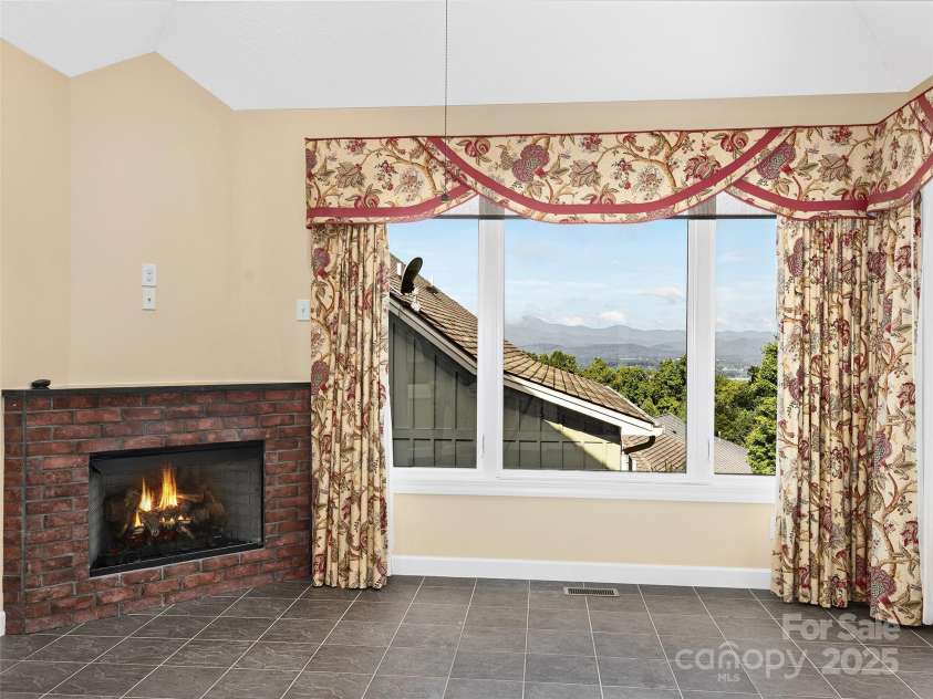 54 Deep Valley Lane, Hendersonville, NC 28791.  MLS# CAR4235346, YatesRealty ID 18323. All Seasons Room