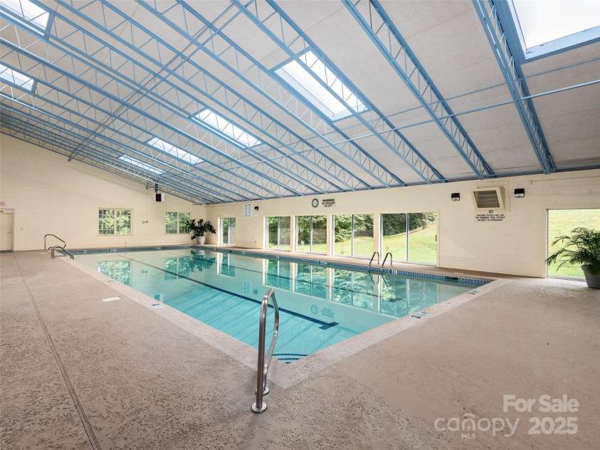 54 Deep Valley Lane, Hendersonville, NC 28791.  MLS# CAR4235346, YatesRealty ID 18323. Indoor Pool