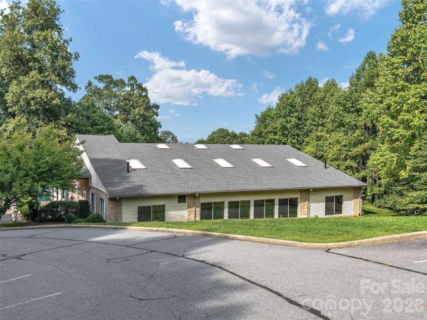 54 Deep Valley Lane, Hendersonville, NC 28791.  MLS# CAR4304196, YatesRealty ID 18323. Back Exterior