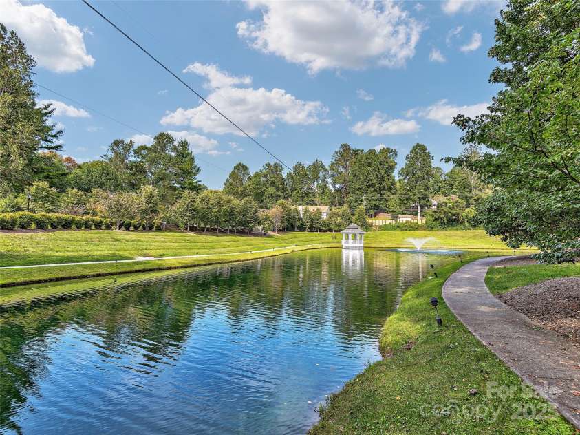 54 Deep Valley Lane, Hendersonville, NC 28791.  MLS# CAR4304196, YatesRealty ID 18323. Pond
