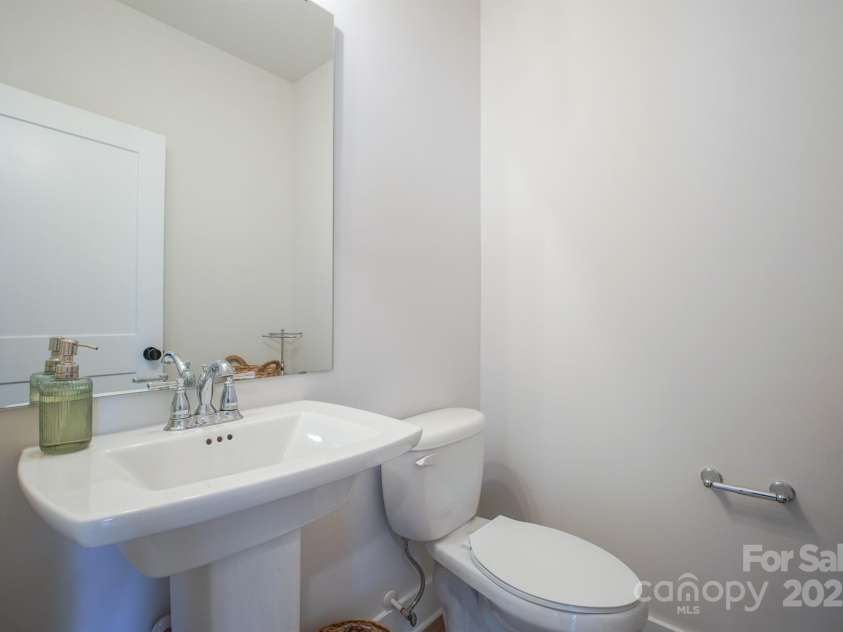 711 Beaty Street, Davidson, NC 28036.  MLS# CAR4261256, YatesRealty ID 18333. Half Bath