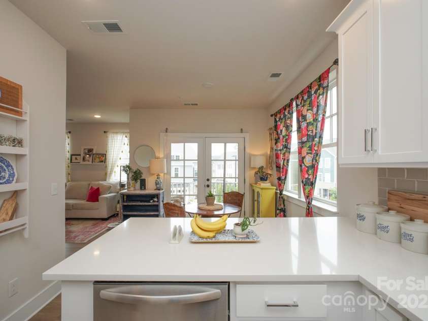 711 Beaty Street, Davidson, NC 28036.  MLS# CAR4261256, YatesRealty ID 18333. Kitchen and Dining