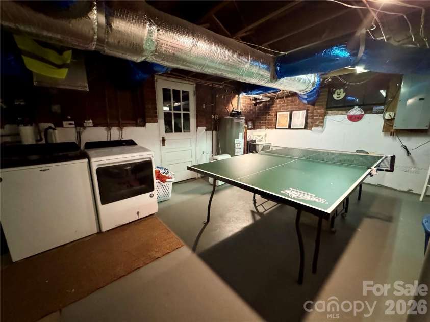 135 Eastover Drive, Concord, NC 28025.  MLS# CAR4372320, YatesRealty ID 18335. Basement second laundry space and rec room. There is plenty of storage space.