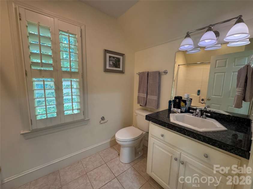 135 Eastover Drive, Concord, NC 28025.  MLS# CAR4372320, YatesRealty ID 18335. Full bath above the garage