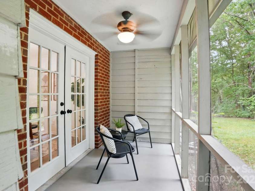 1035 Wexford Place, Concord, NC 28027.  MLS# CAR4264207, YatesRealty ID 18338. Enjoy Nature and Privacy in your Cozy Screened-In Porch