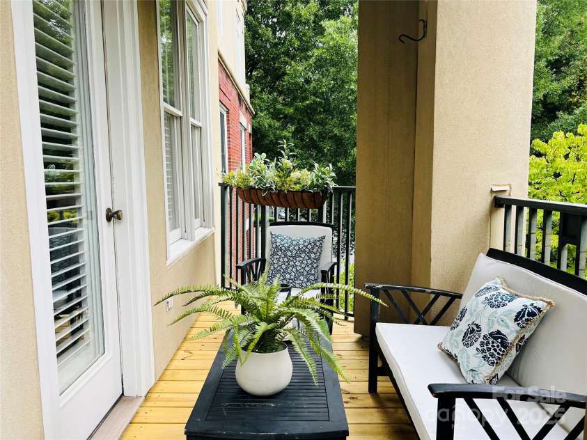 416 Queens Road, Charlotte, NC 28207.  MLS# CAR4289305, YatesRealty ID 18343. Balcony off of Family Room