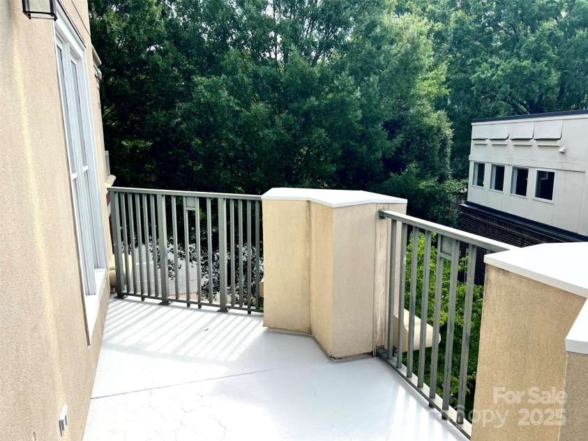 416 Queens Road, Charlotte, NC 28207.  MLS# CAR4289305, YatesRealty ID 18343. Balcony off Primary Bedroom