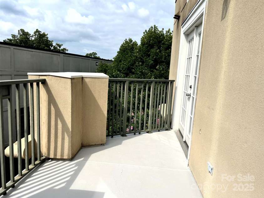 416 Queens Road, Charlotte, NC 28207.  MLS# CAR4289305, YatesRealty ID 18343. Balcony off Primary Bedroom