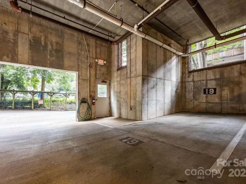 416 Queens Road, Charlotte, NC 28207.  MLS# CAR4289305, YatesRealty ID 18343. The other parking spot #19