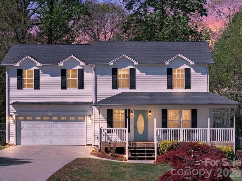 7 Collin Lane, Thomasville, NC 27360.  MLS# CAR4369183, YatesRealty ID 18344. Front view sunset 