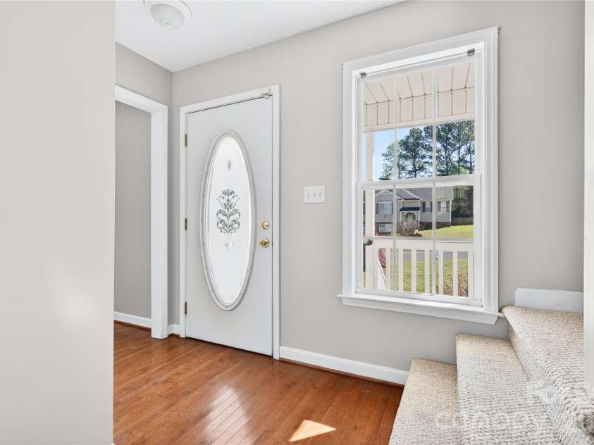7 Collin Lane, Thomasville, NC 27360.  MLS# CAR4369183, YatesRealty ID 18344. Inside of front door 