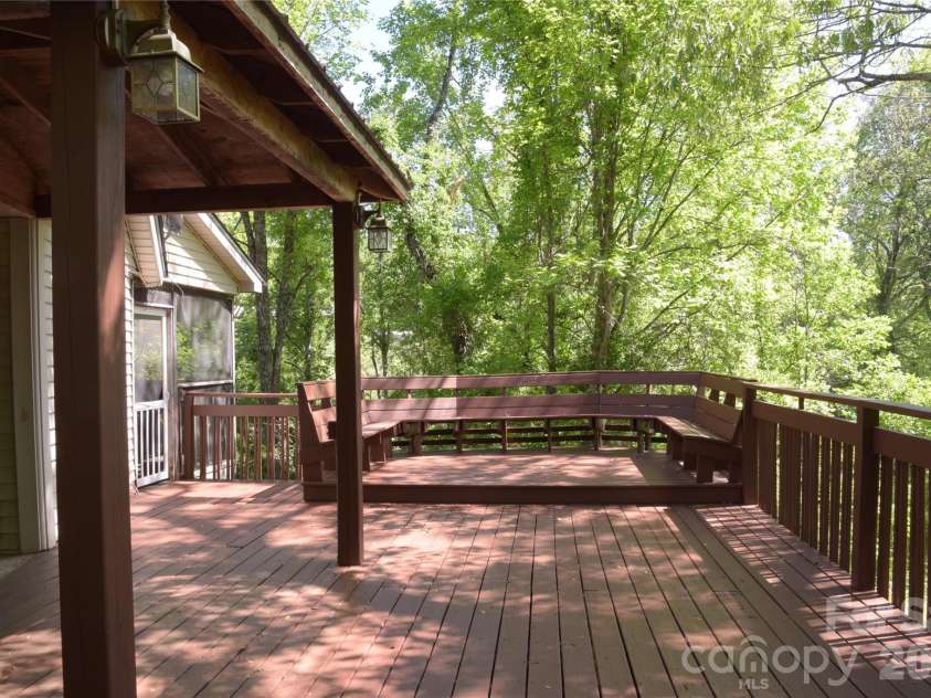 344 Mills River Road, Mills River, NC 28759.  MLS# CAR4374201, YatesRealty ID 18346. Deck with built in seating