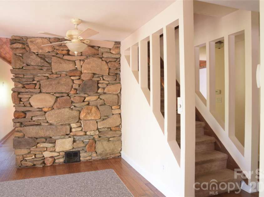 344 Mills River Road, Mills River, NC 28759.  MLS# CAR4374201, YatesRealty ID 18346. Dining and stairs, greenhouse to left