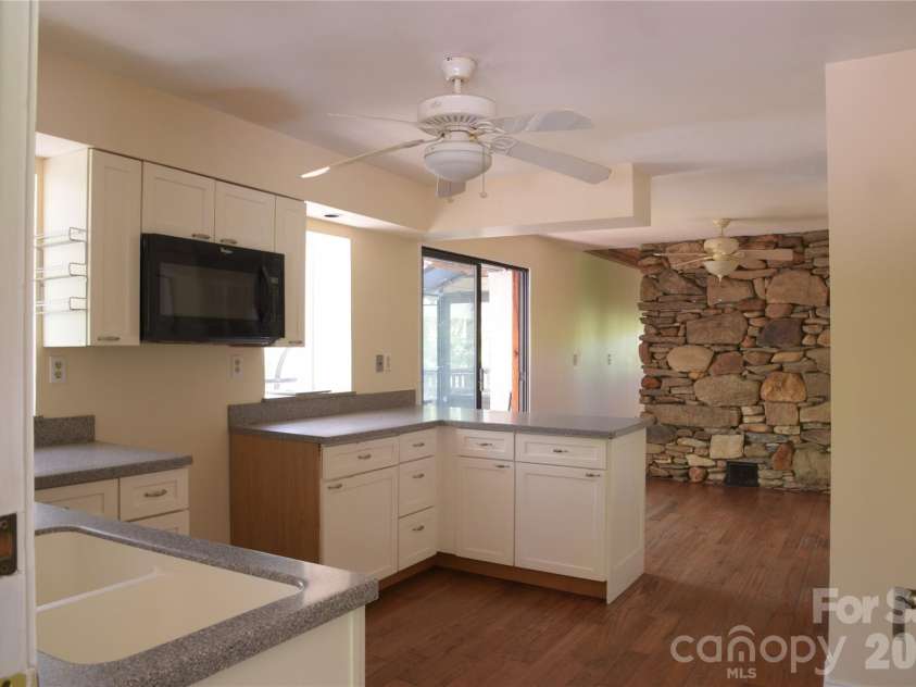 344 Mills River Road, Mills River, NC 28759.  MLS# CAR4374201, YatesRealty ID 18346. Entering from mudroom to kitchen