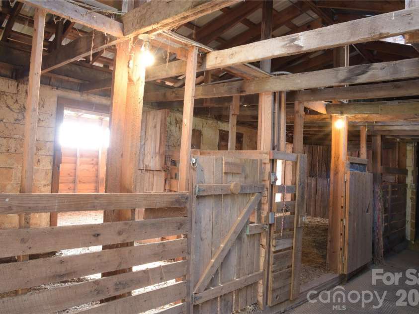 344 Mills River Road, Mills River, NC 28759.  MLS# CAR4374201, YatesRealty ID 18346. Inside barn