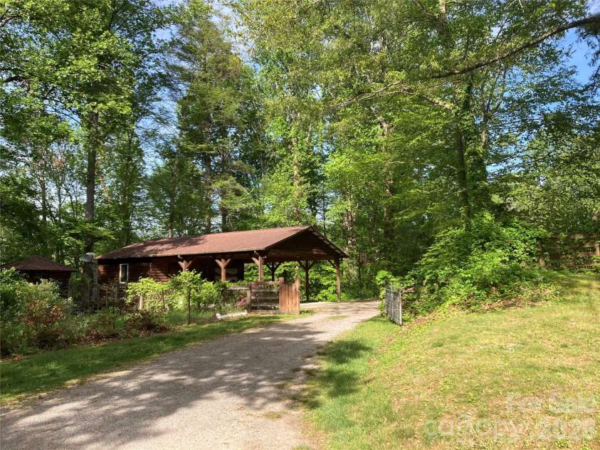 344 Mills River Road, Mills River, NC 28759.  MLS# CAR4374201, YatesRealty ID 18346. Studio building view from house