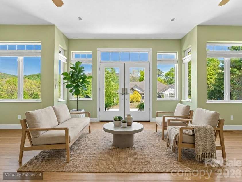 16 Chickadee Lane, Fairview, NC 28730.  MLS# CAR4375126, YatesRealty ID 18349. Amazing sunroom