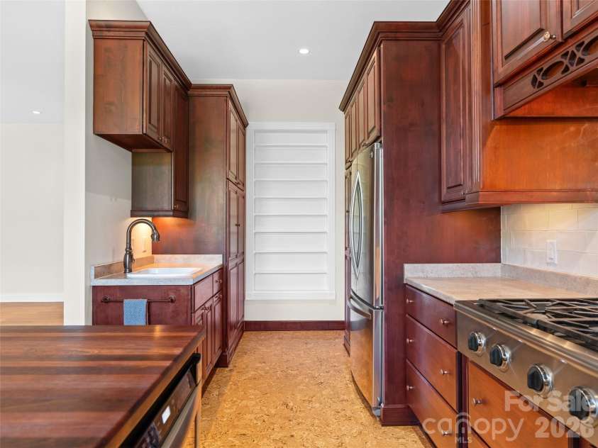 16 Chickadee Lane, Fairview, NC 28730.  MLS# CAR4375126, YatesRealty ID 18349. So much storage and a nook for canning jars