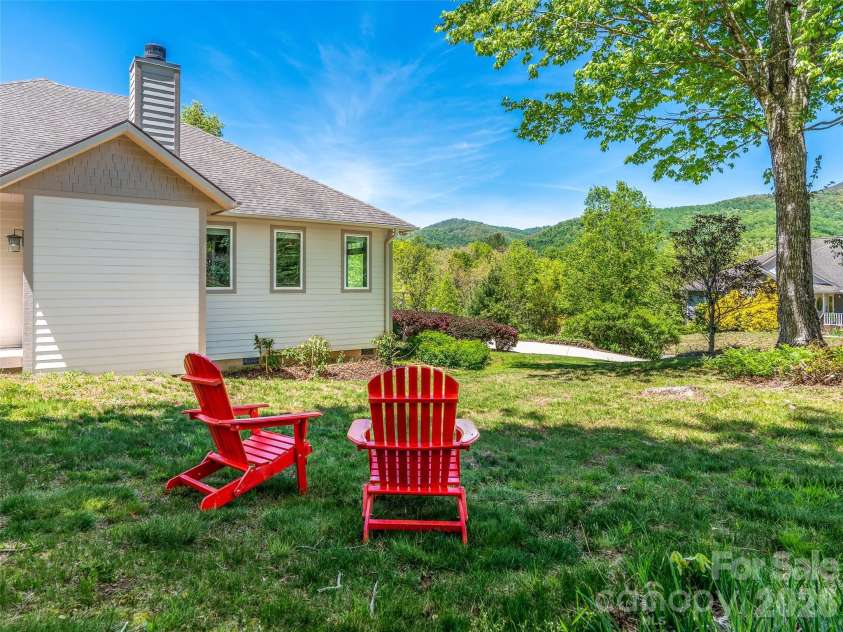 16 Chickadee Lane, Fairview, NC 28730.  MLS# CAR4375126, YatesRealty ID 18349. Sunsets on the mountains
