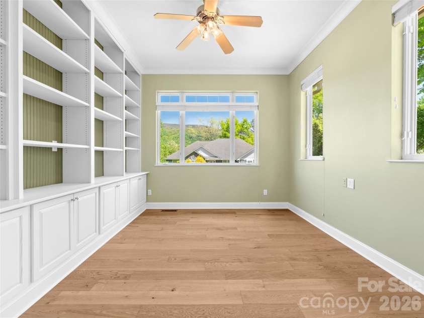 16 Chickadee Lane, Fairview, NC 28730.  MLS# CAR4375126, YatesRealty ID 18349. With built in bookcases