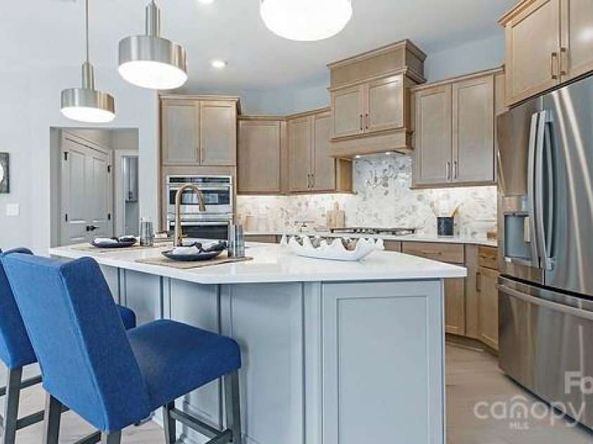 8111 Stillhouse Lane, Harrisburg, NC 28075.  MLS# CAR4330740, YatesRealty ID 1835. Not Actual Property - Kitchen