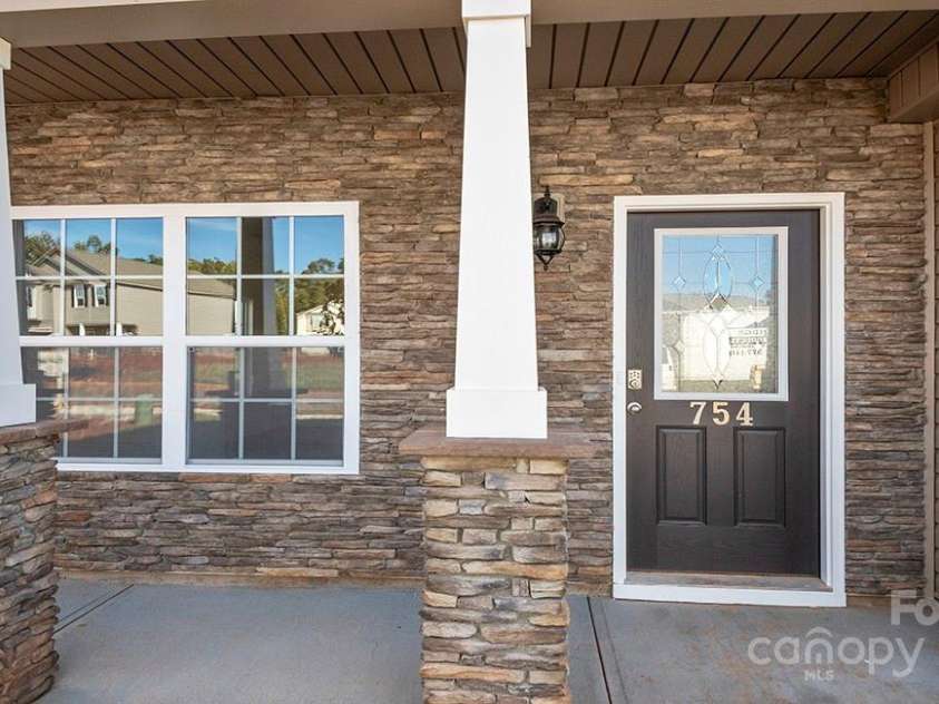 163 Bovine Branch Road, Fletcher, NC 28732.  MLS# CAR4268820, YatesRealty ID 18352. Photos are representative