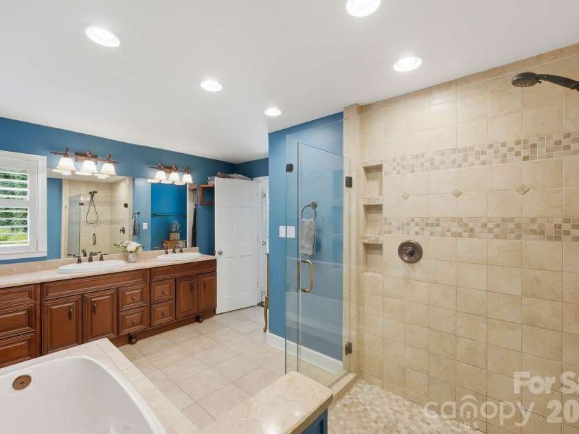 20200 Floral Lane, Cornelius, NC 28031.  MLS# CAR4374755, YatesRealty ID 18352. Double vanity in the Primary Bath