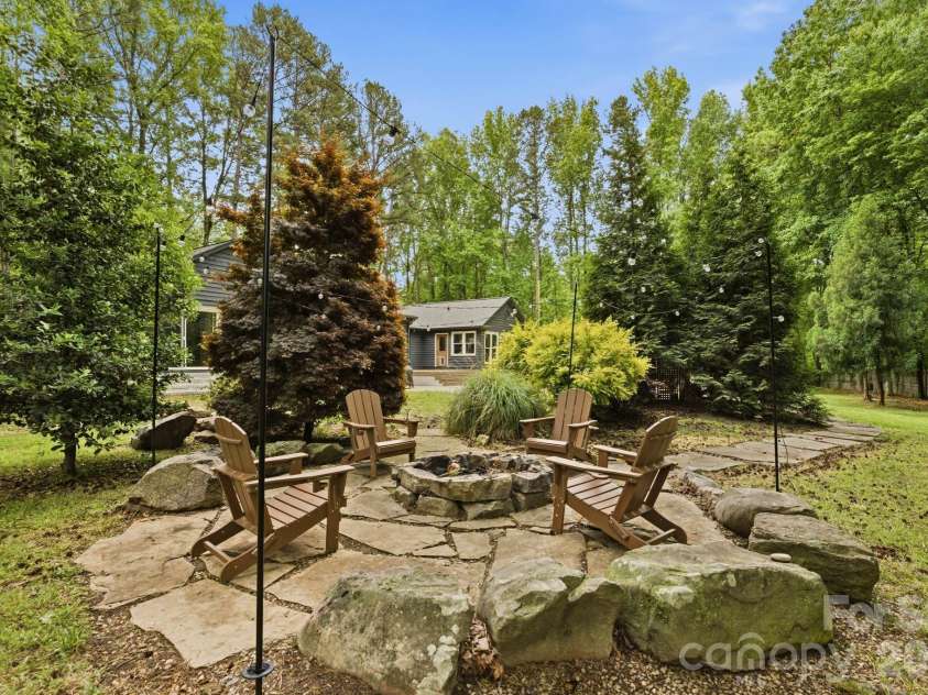 20200 Floral Lane, Cornelius, NC 28031.  MLS# CAR4374755, YatesRealty ID 18352. Fire pit area
