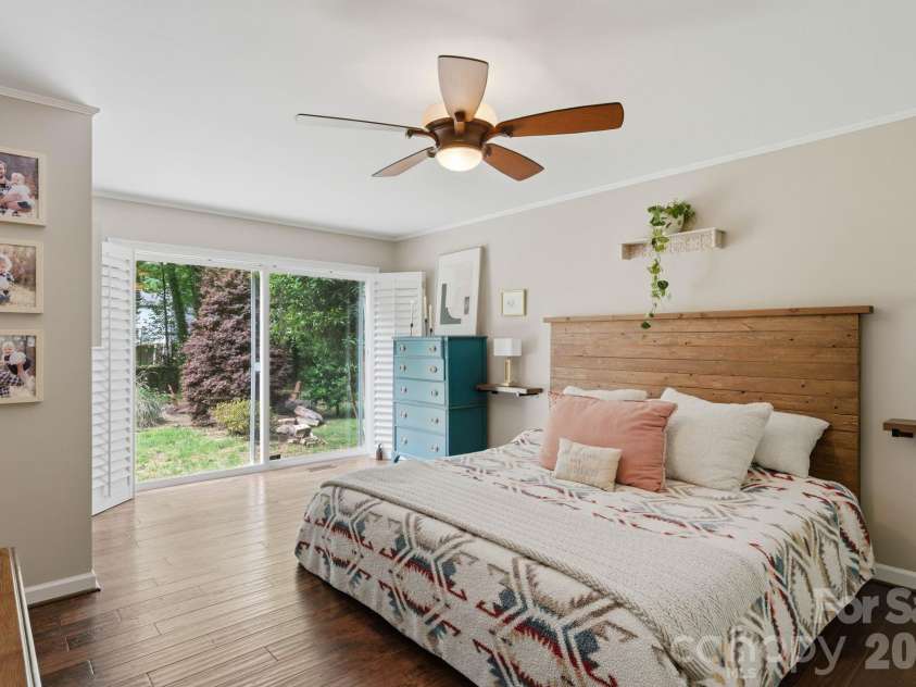 20200 Floral Lane, Cornelius, NC 28031.  MLS# CAR4374755, YatesRealty ID 18352. Primary Bedroom overlooking the backyard